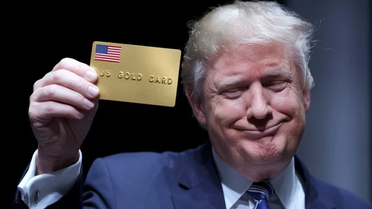 Donald Trump smirking & showing Image of Gold Card